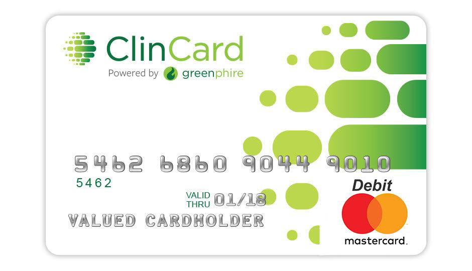 a credit card with a green and white design